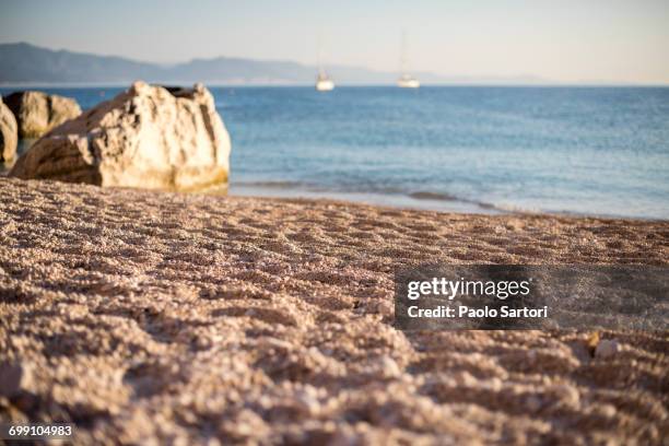 sunrise in cala goloritz, sardinia, italy. - cala goloritze stock-fotos und bilder