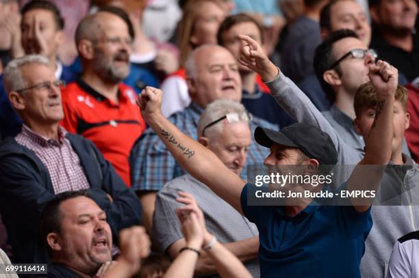 Rotherham United fans show their support in the stands