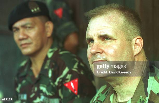 Lt. Col. David Maxwell, commander of the U.S. Special Forces'' 1st Battalion, speaks briefly with the news media after arriving at the 103rd Brigade...