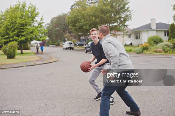 playing basketball - cul de sac stock pictures, royalty-free photos & images