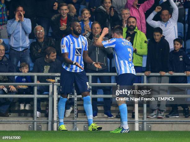 Coventry City's Reda Johnson celebrates scoring his side's first goal of the game against Southend United with Chris Stokes.