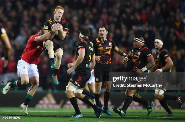 Hamilton , New Zealand - 20 June 2017; Finlay Christie of the Chiefs is tackled by Robbie Henshaw of the British & Irish Lions during the match...