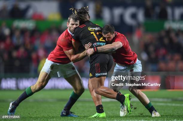 Hamilton , New Zealand - 20 June 2017; Johnny Faauli of the Chiefs is tackled by Jared Payne, left, and Robbie Henshaw of the British and Irish Lions...
