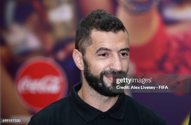 Legend Simao Sabrosa looks on as he meets volunteers working at the Spartak Stadium ahead of the FIFA Confederations Cup Russia 2017 Group A match...