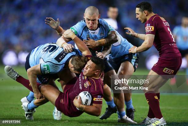 Josh Papalii of the Maroons is tackled during game two of the State Of Origin series between the New South Wales Blues and the Queensland Maroons at...