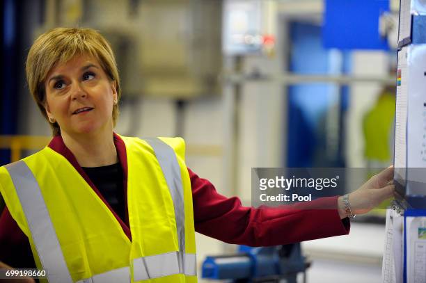 First Minister of Scotland Nicola Sturgeon meets apprentices as she visits the Michelin Tyre factory on June 21, 2017 in Dundee, Scotland. More than...