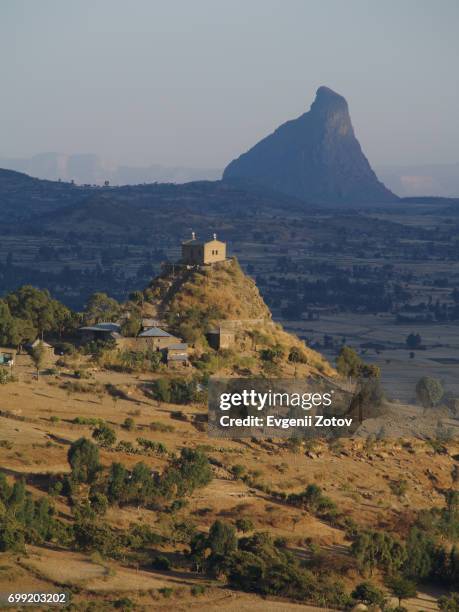 view on abba pentalewon church in vicinity of aksum city in ethiopia - axum - fotografias e filmes do acervo