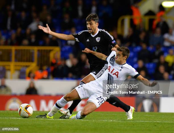 Tottenham Hotspur's Harry Winks tackles Qarabag's Michel