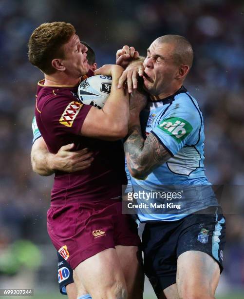 Dylan Napa of the Maroons is tackled by David Klemmer of the Blues during game two of the State Of Origin series between the New South Wales Blues...