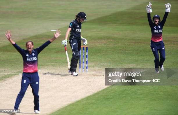 Jenny Gunn of England and Lauren Winfield of England appeal successfully for the wicket of Amy Satterthwaite of New Zealand during the ICC Women's...
