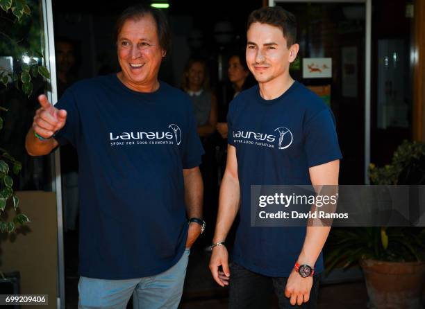 President of Laureus Spain Gabriel Masfurroll and MotoGP rider and new Laureus Ambassador Jorge Lorenzo of Spain pose for the media at the Jeroni de...