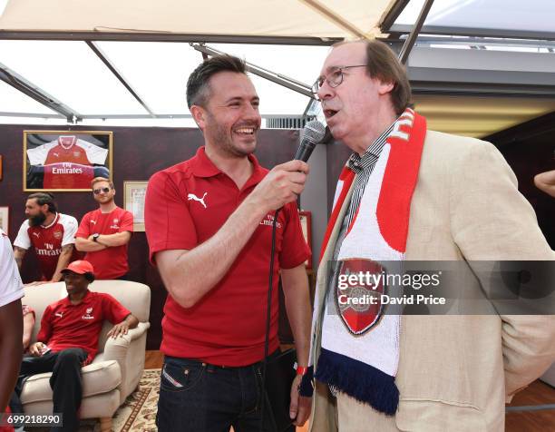 Former Arsenal player Charlie George on stage as he helps introduce the new Arsenal Puma Home kit at King's Cross St. Pancras Station on June 21,...