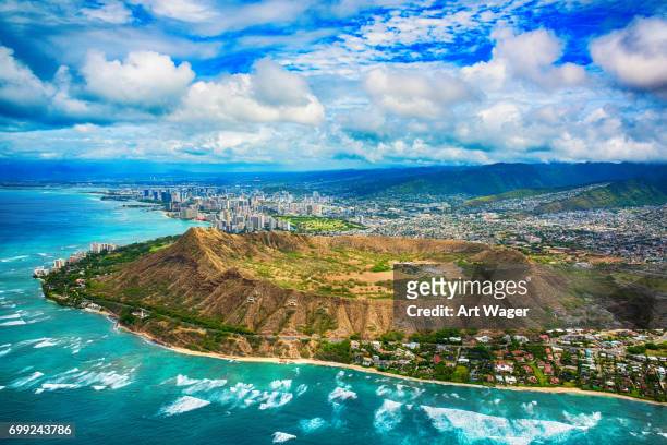 aerial of honolulu hawaii beyond diamond head - dramatic sky over ocean stock pictures, royalty-free photos & images