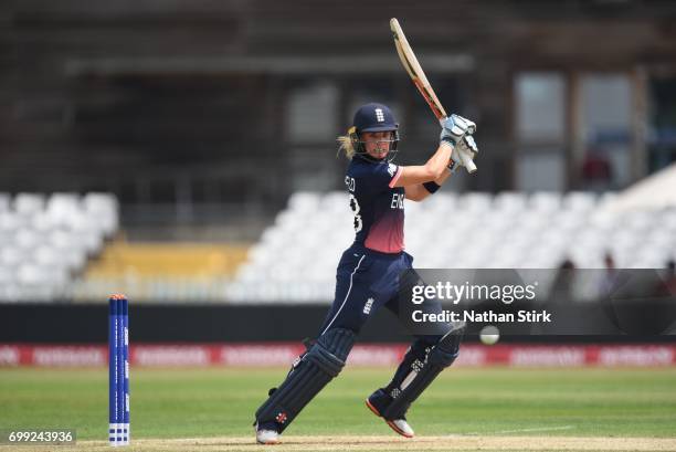 Lauren Winfield of England Women's drives the ball during the ICC women's world cup warm up match between England Women's and New Zealand on June 21,...