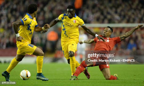 Sion's Ebenezer Assifuah battles for the ball with Liverpool's Jordan Ibe