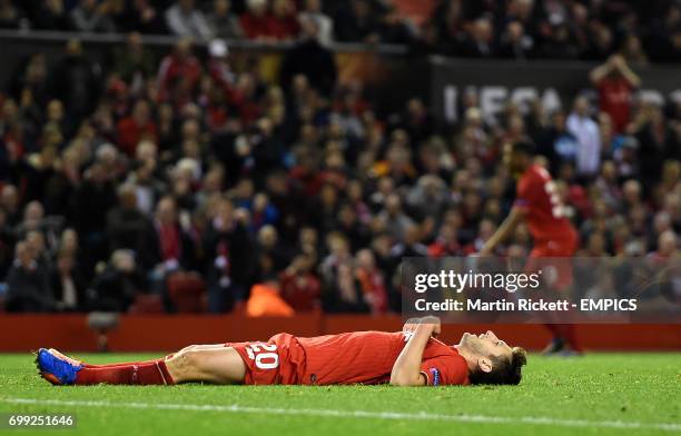 Liverpool's Adam Lallana reacts after a missed chance against FC Sion