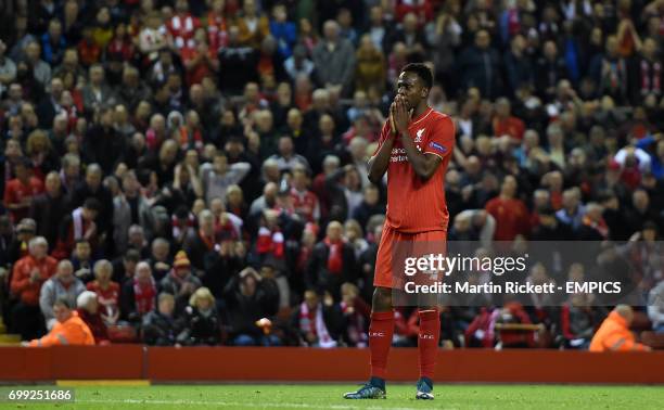 Liverpool's Divock Origi shows his dejection after a missed chance against FC Sion