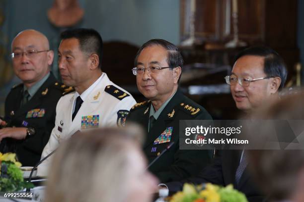 Members of the Chinese Government including Chinese State Councilor Yang Jiechi, and Chief of the People's Liberation Army Joint Staff Department...