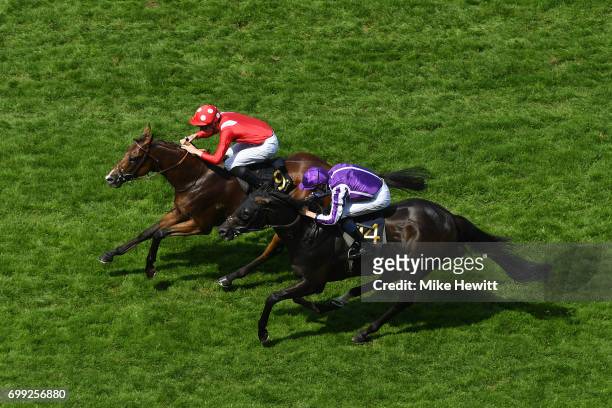 Pierre-Charles Boudot on Le Brivido just pip Donnacha O'Brien on Spirit of Valour to victory in the Jersey Stakes on Day Two of Royal Ascot at Ascot...