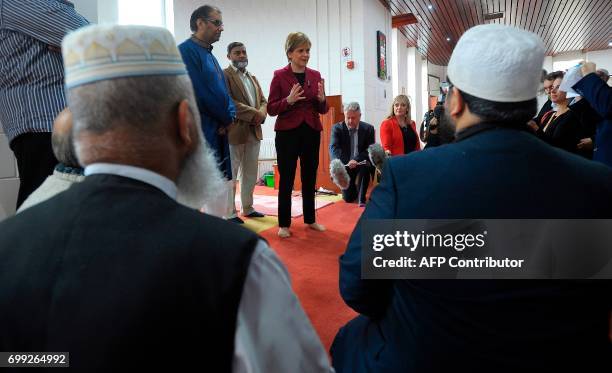 Scotland's First Minister and Scottish National Party leader Nicola Sturgeon meets worshippers during a visit to Dundee Central Mosque in Dundee,...