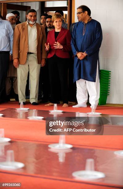 Scotland's First Minister and Scottish National Party leader Nicola Sturgeon meets worshippers during a visit to Dundee Central Mosque in Dundee,...