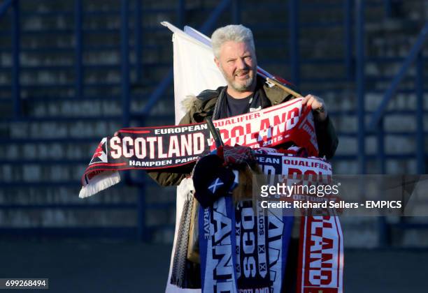 Scarf seller at Hamden Park before the Scotland v Poland qualifier