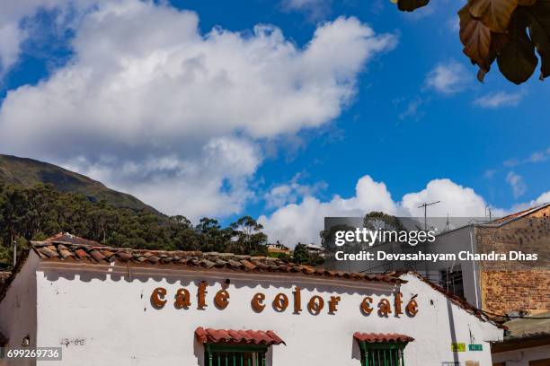bogota, colombia - looking up from plaza chorro de quevedo on clear sunny day - plaza del chorro de quevedo stock pictures, royalty-free photos & images