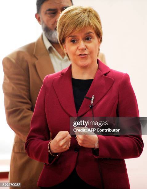 Scotland's First Minister and Scottish National Party leader Nicola Sturgeon meets worshippers during a visit to Dundee Central Mosque in Dundee,...