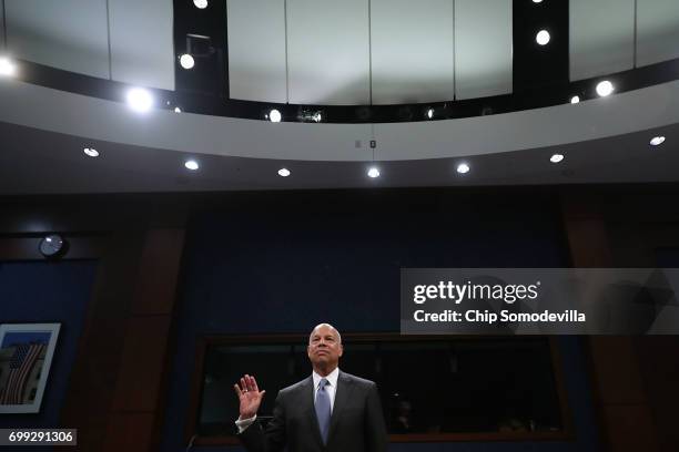 Former Homeland Security Secretary Jeh Johnson is sworn in before testifying to the House Intelligence Committee in an open hearing in the U.S....