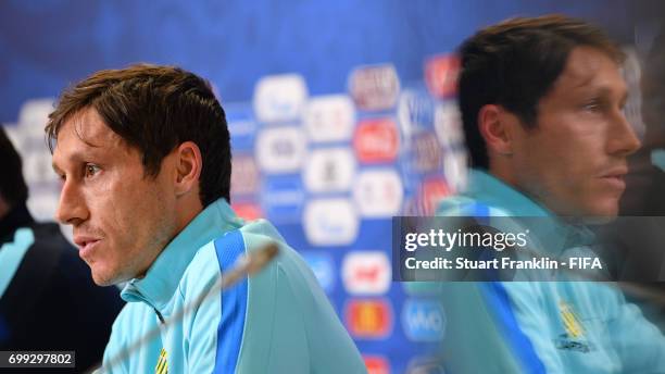 Mark Milligan, captain of Australia talks with the media during a press conference on June 21, 2017 in Saint Petersburg, Russia.