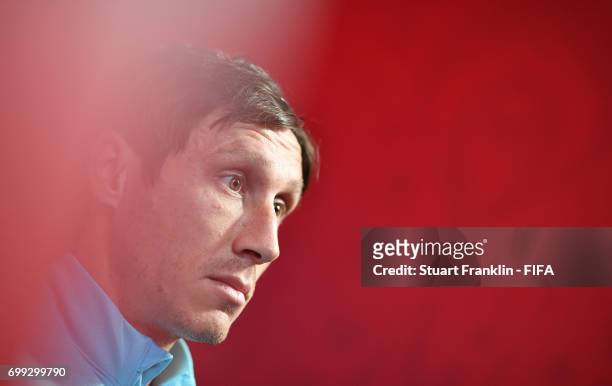 Mark Milligan, captain of Australia talks with the media during a press conference on June 21, 2017 in Saint Petersburg, Russia.