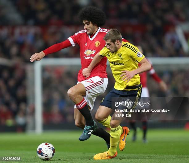 Manchester United's Marouane Fellaini and Middlesbrough's Jack Stephens battle for the ball