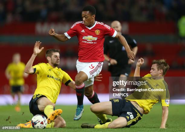 Manchester United's Anthony Martial and Middlesbrough's Tomas Kalas battle for the ball