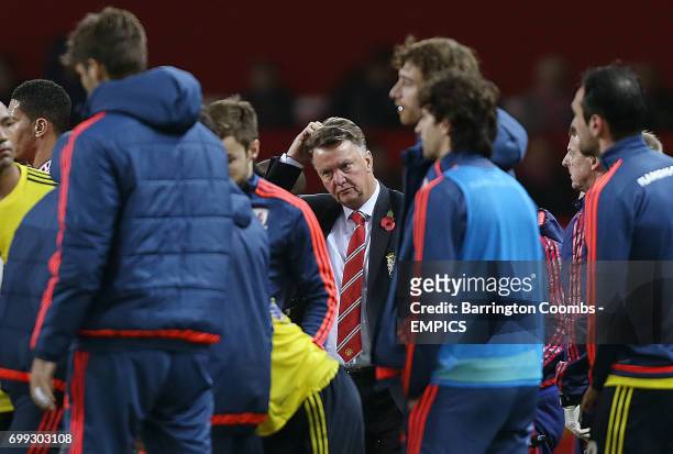 Manchester United's manager Louis van-Gaal scratches his head during the extra time period against Middlesbrough