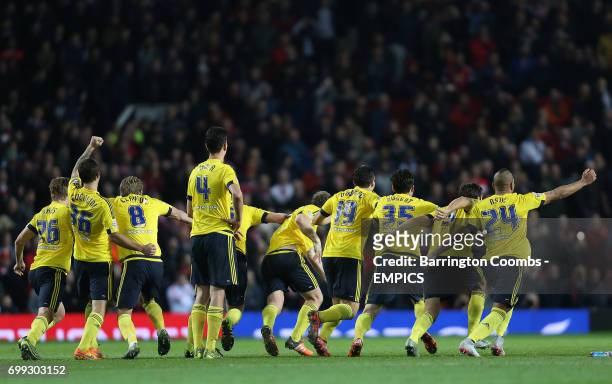 Middlesbrough's players run to celebrate winning against Manchester United