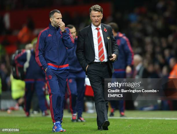 Manchester United's manager Louis van-Gaal and his assistant Ryan Giggs look dejected at the end of the game against Middlesbrough