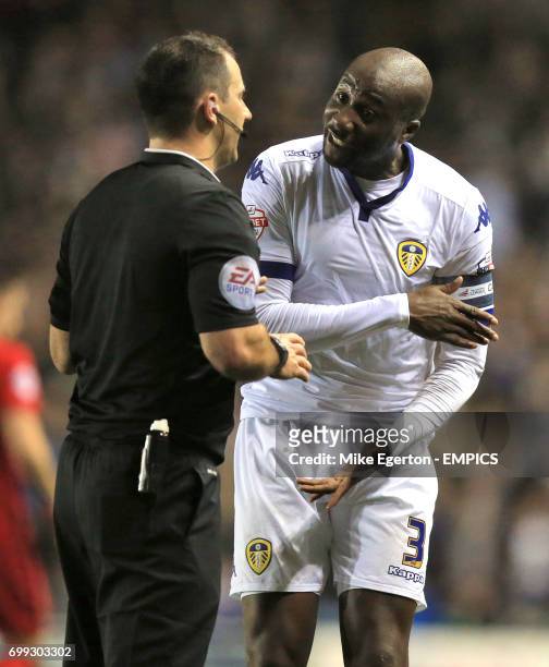 Leeds United's captain Sol Bamba argues with referee Tim Robinson