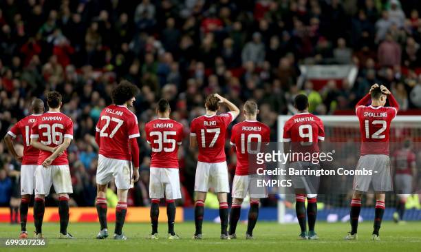 Manchester United players during the penalty shootout