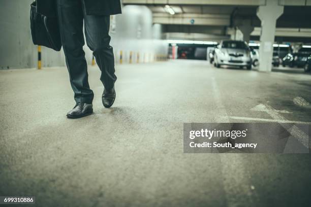 walking in garage - dress shoe imagens e fotografias de stock