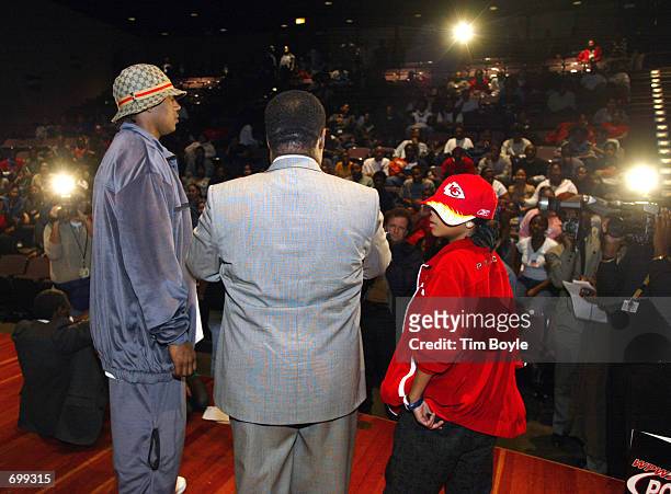 Rapper Master P , principal of Orr High School Leo Hudnall and rapper Lil Romeo address students February 7, 2002 in Chicago, IL. The singers came to...