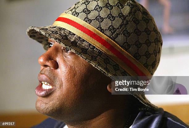 Rappers Master P takes a moment at Orr High School February 7, 2002 in Chicago, IL. The singer and fellow rapper Lil Romeo came to the school to...