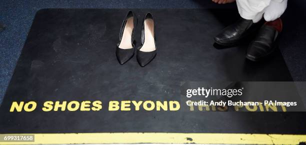 The shoes of First Minister Nicola Sturgeon during her visit to Dundee Central Mosque in Dundee.