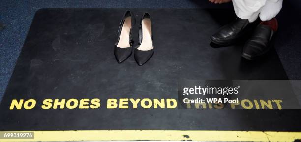 The shoes of Scotland's First Minister and Scottish National Party leader Nicola Sturgeon are pictured during her visit to Dundee Central Mosque on...