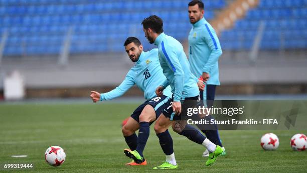 Aziz Eraltay and Mathew Leckie in action during a training session on June 21, 2017 in Saint Petersburg, Russia.