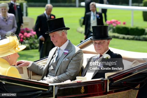 Queen Elizabeth II, Prince Charles, Prince of Wales and Lord Fellowes arrive with the Royal Procession on day 2 of Royal Ascot at Ascot Racecourse on...