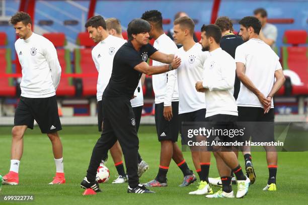 Jochim Loew, head coach of team Germany reacts to his player Joshua Kimmich during a team Germany training session at Kazan Arena on June 21, 2017 in...