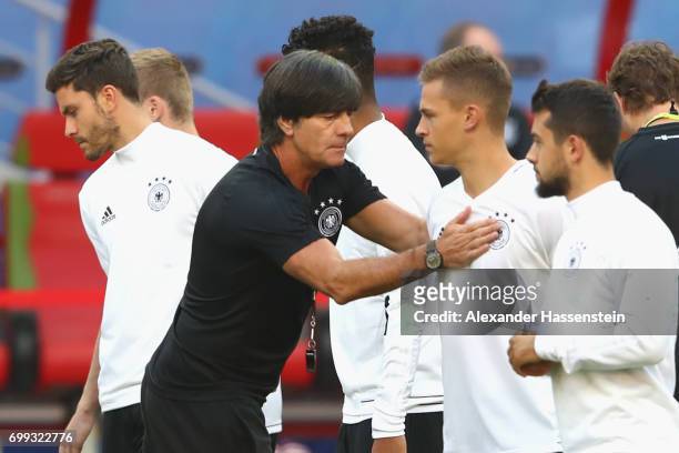 Jochim Loew, head coach of team Germany reacts to his player Joshua Kimmich during a team Germany training session at Kazan Arena on June 21, 2017 in...