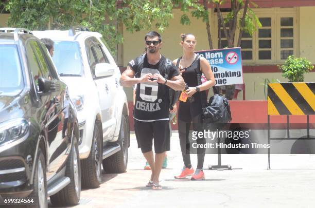 Karan Singh Grover and Bipasha Basu spotted at their gym in Bandra on June 18, 2017 in Mumbai, India. The interiors of restaurant were done by Gauri.