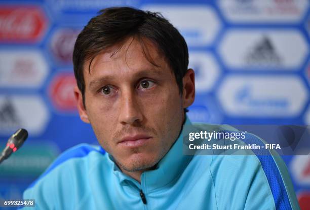 Mark Milligan, captain of Australia talks with the media during a press conference on June 21, 2017 in Saint Petersburg, Russia.