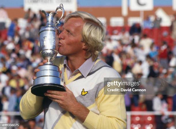 Greg Norman of Australia kisses the Claret Jug after winning his first major title during the final round of the 115th Open Championship held on 20th...